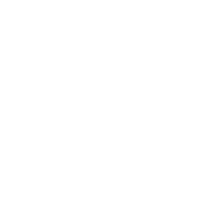 A white dart hitting the bullseye of a target symbol.